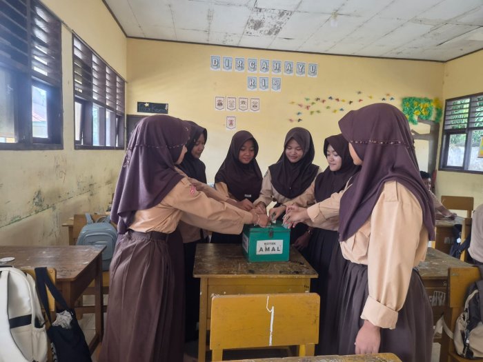Kokurikuler MTsN 6 Muaro Jambi: Menanamkan Semangat Infak Melalui Aksi Nyata